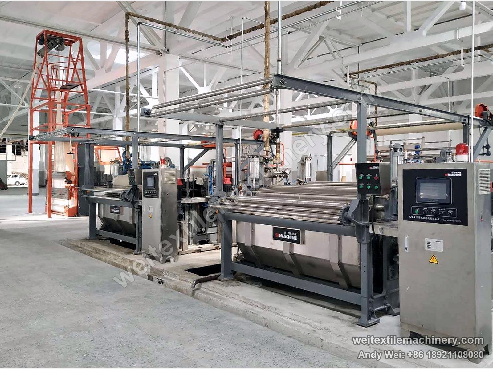 Earlier-generation QL crabbing machine with its control cabinet, the rope opener tower behind