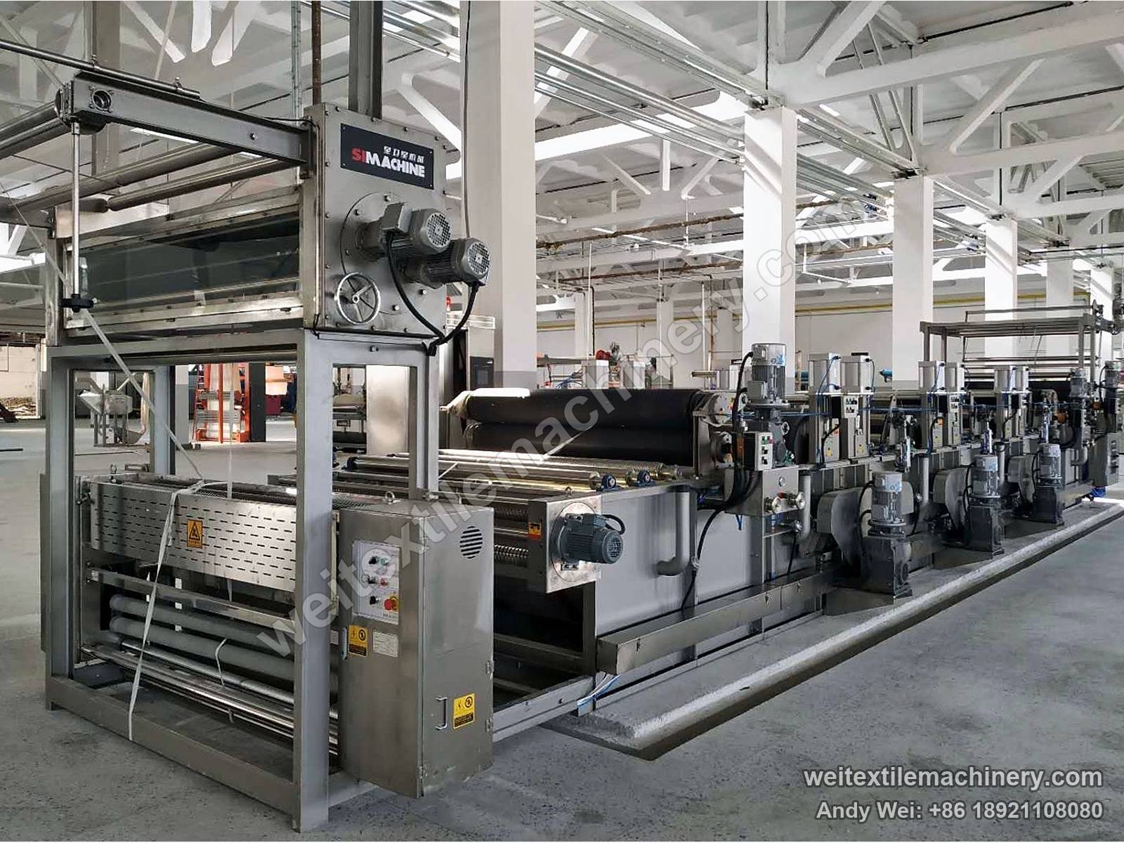 Side view of the QL continuous crabbing and drying line, crabbing units and drive motors