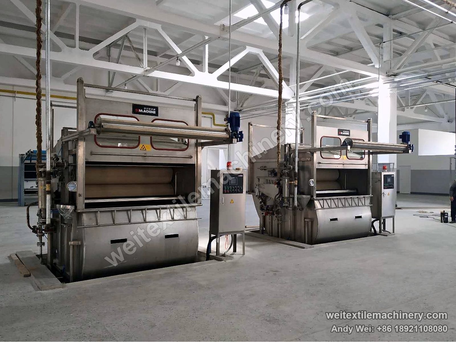 Two QL rope scouring machines side by side in the new finishing hall at UZWOOLENTEX