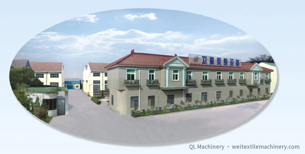 Panorama of the old works: a two-storey building with a red tiled roof, and a sign on the roof reading Weixing Dyeing & Finishing Equipment