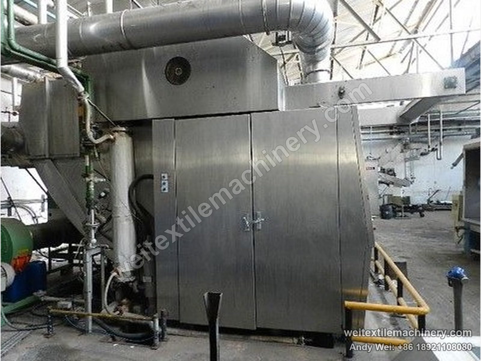 Used Biancalani AIRO 1000 air-flow tumbler finishing machine, rear view with stainless cabinet and air ducting