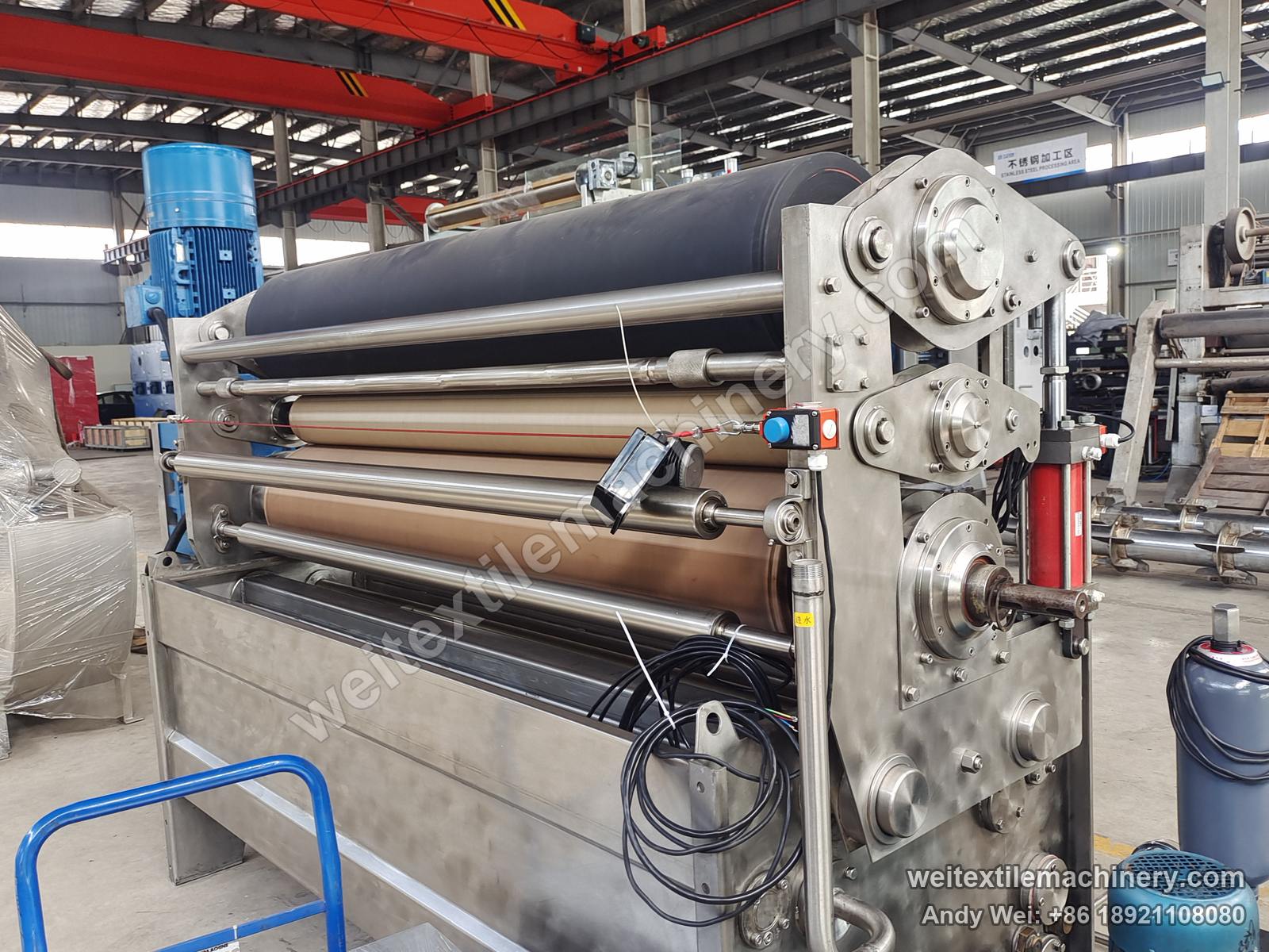 Used CIMI squeezing machine (3 rolls), other side with roller stack, guide rolls, edge sensor and top motor