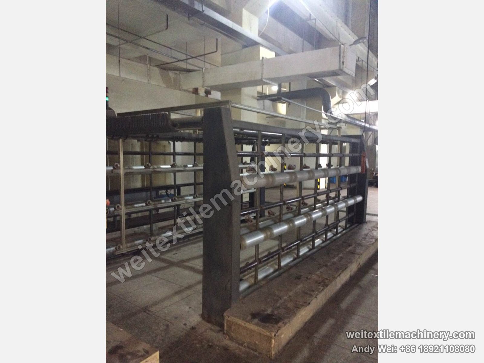 Used CMT LTT wool tops backwashing line, creel side view with tiers of ball winding positions and top guide bar