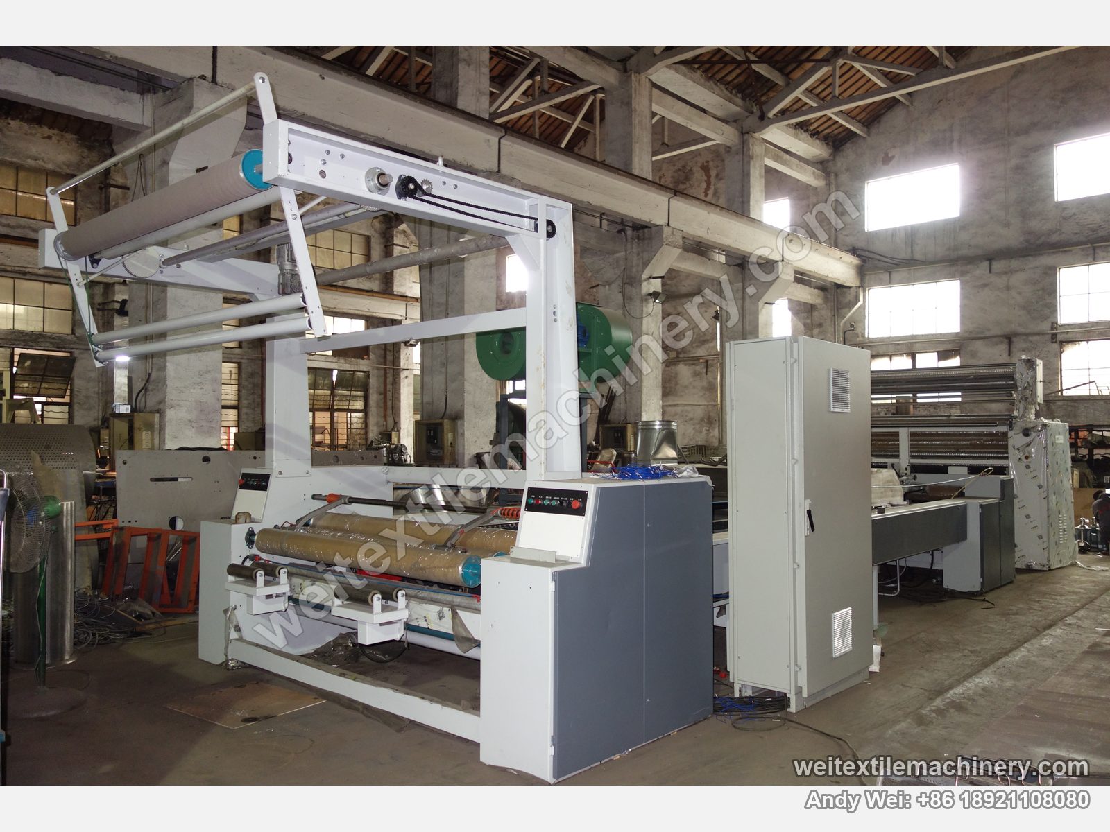 Used CoMaR SIRIO pin-chain steaming-shrinking machine, entry end with feed frame, feed rollers, push-button station and electrical cabinet