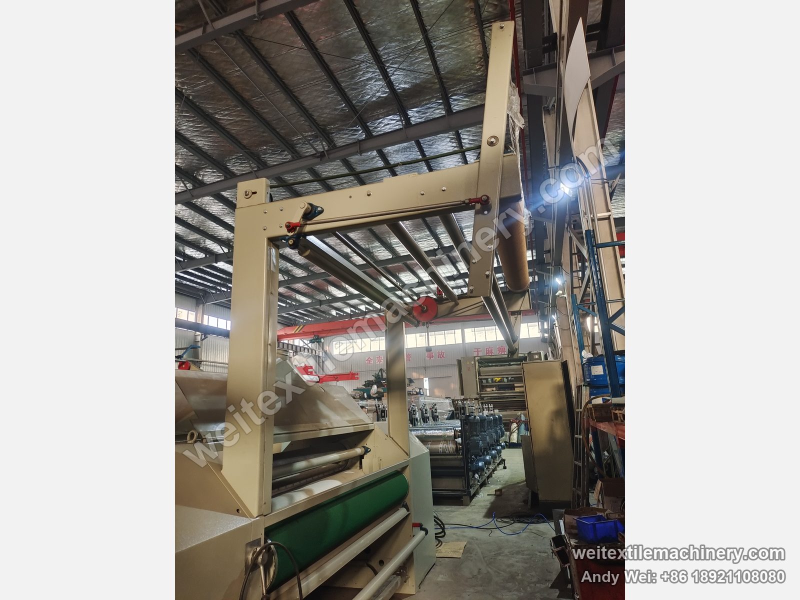 Used Danti Paolo SH8 fabric polishing machine (1.8 m), feed frame with guide rollers over the green conveyor belt