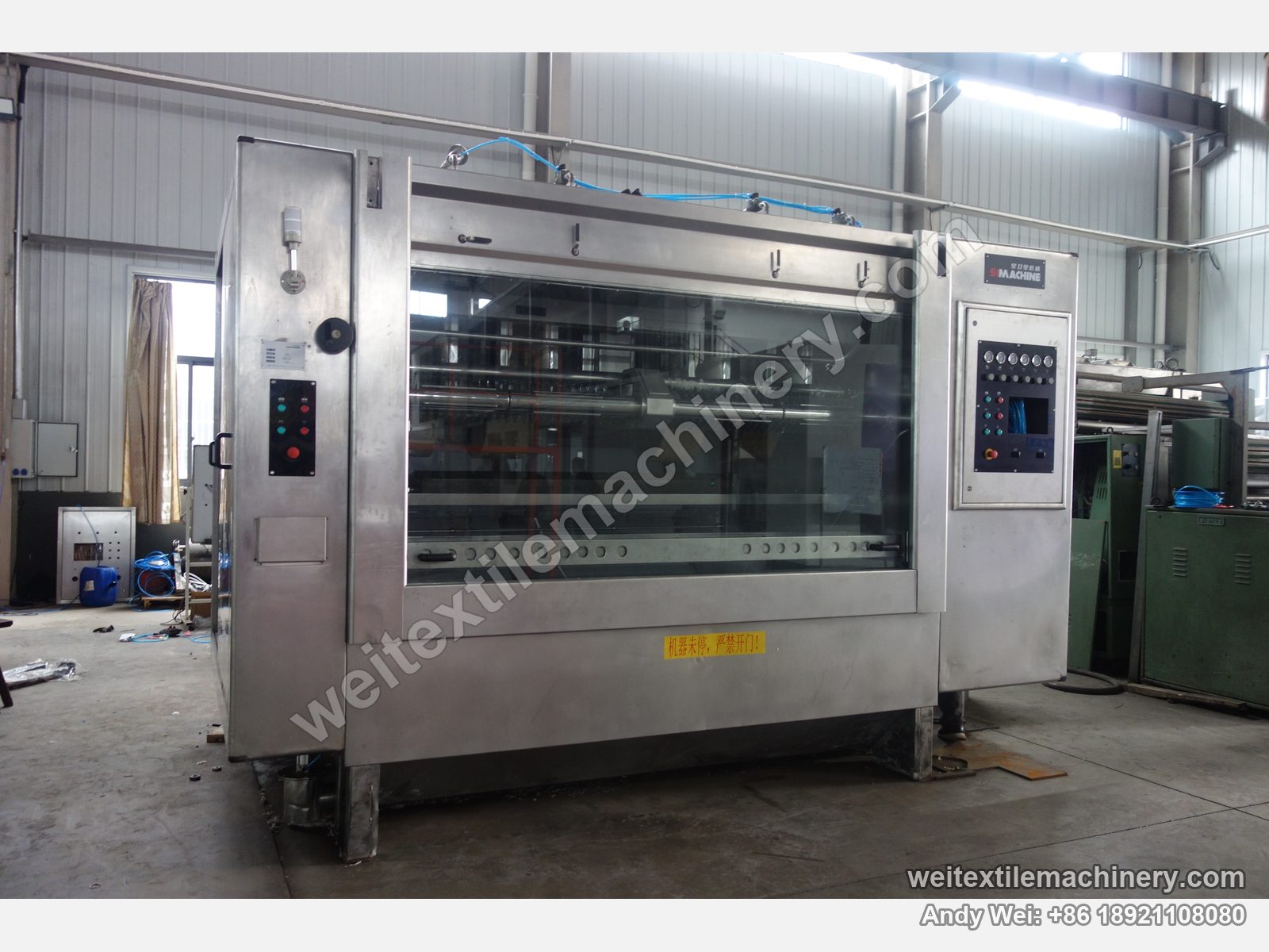Used Famit F4 SOFT rope scouring and milling machine, front view with stainless body, large inspection window and a SIMACHINE control cabinet