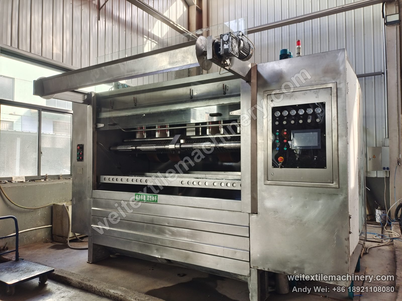 Used Famit F4 SOFT rope scouring and milling machine after QL rebuild, hood raised showing milling rolls, new HMI panel