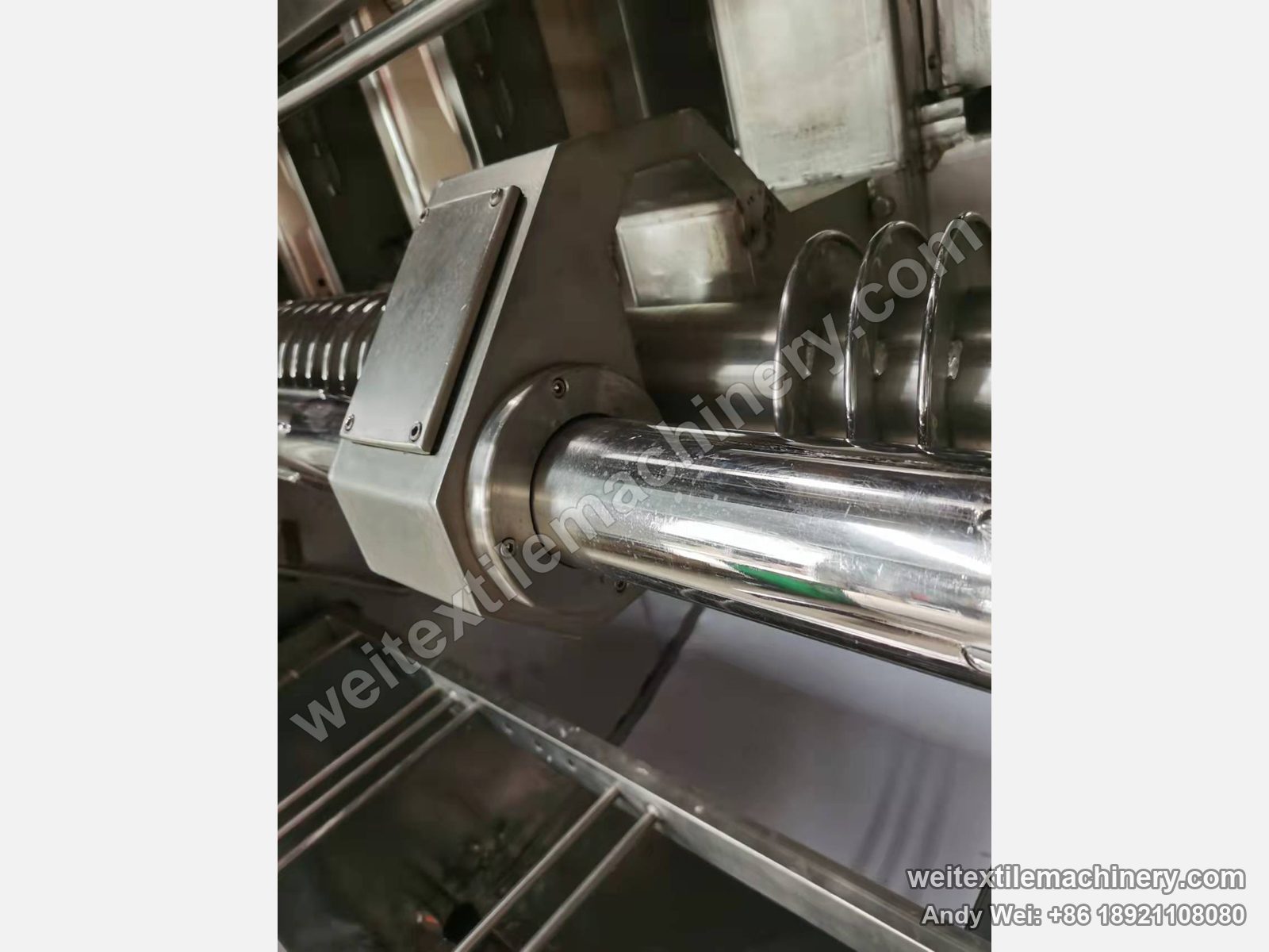 Used Famit F4 SOFT rope scouring and milling machine, mid-span bearing housing of the spiral spreader bar on one chrome shaft