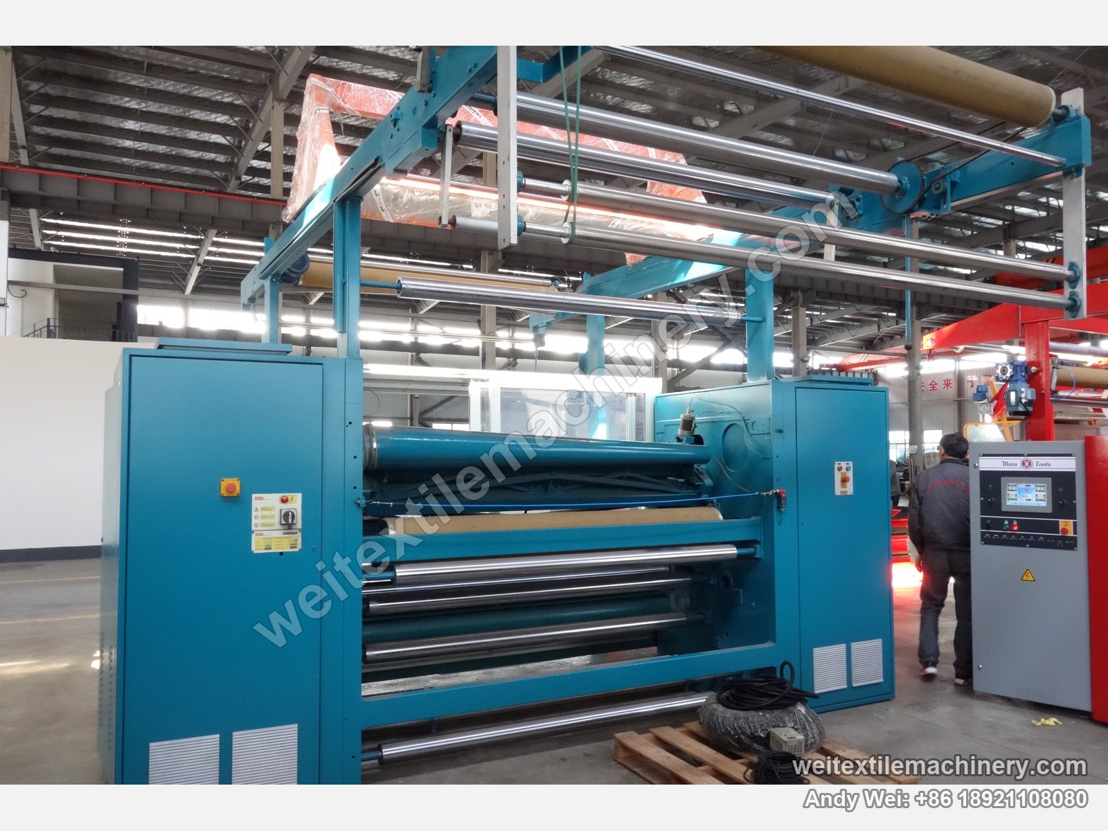 Used Lafer CMS2 shearing machine, rear view with guide roll stack and overhead fabric frame
