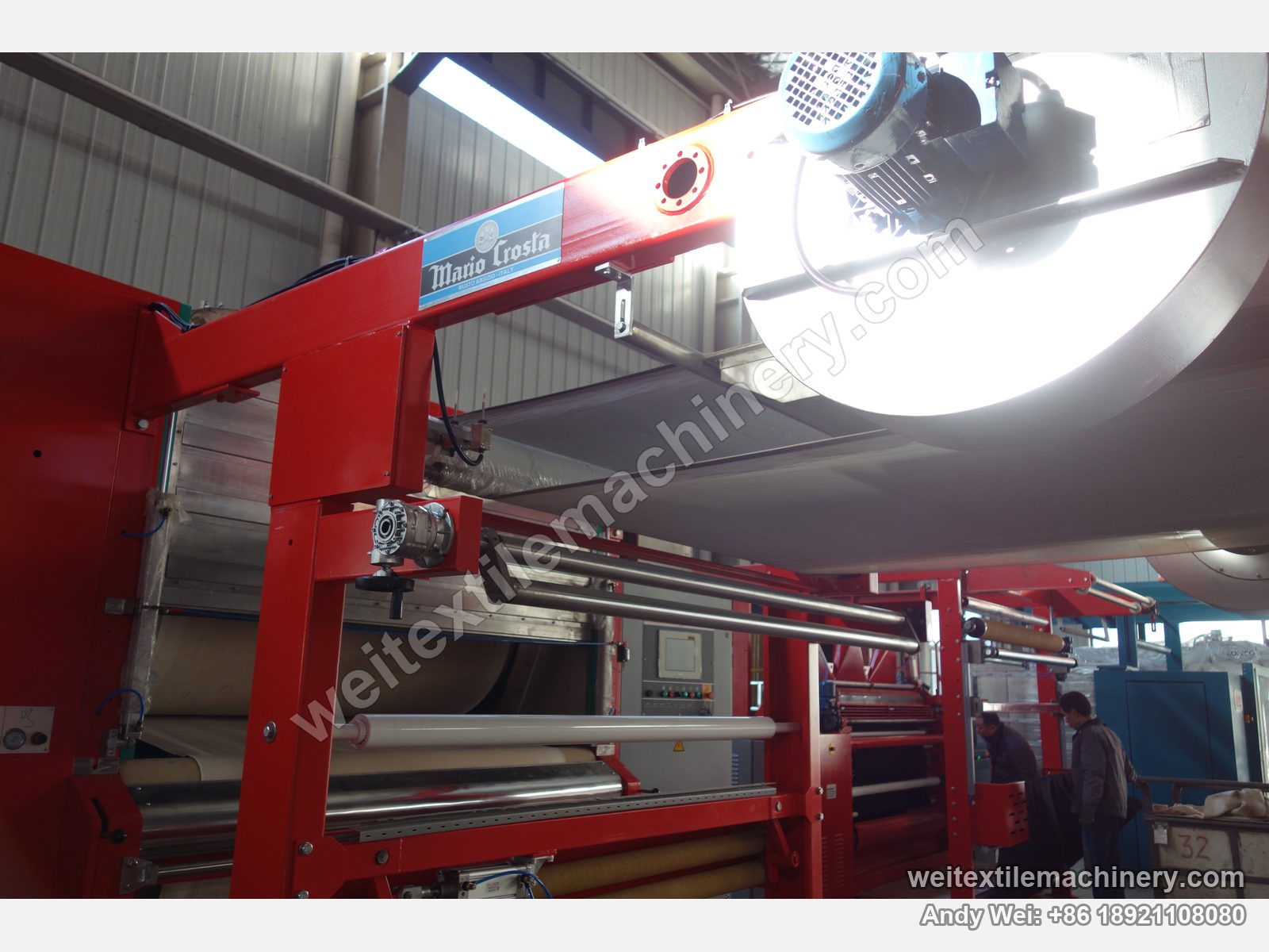 Used Mario Crosta DSS batch decatizing machine, Mario Crosta Busto Arsizio plate on the top beam with motor and stainless steam box above