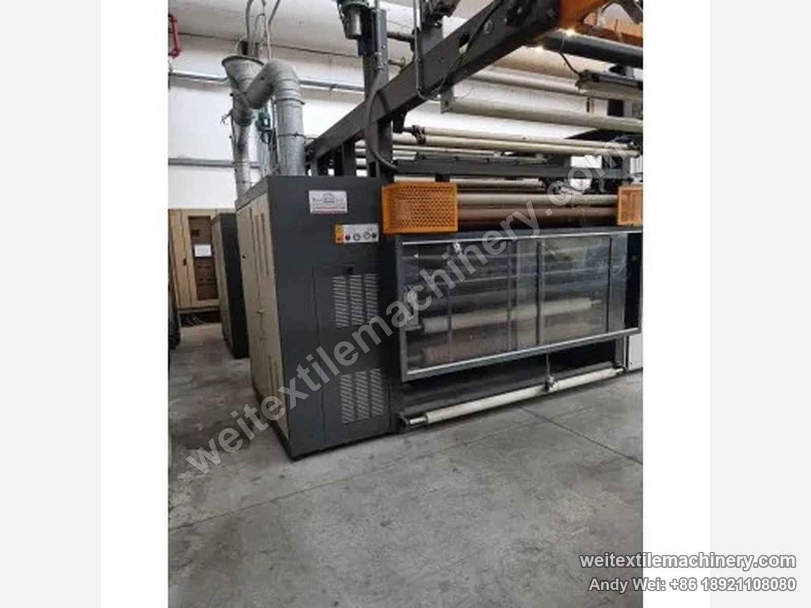 Used Mario Crosta MC 10/36 raising machine, side view with body, overhead fabric frame and dust duct
