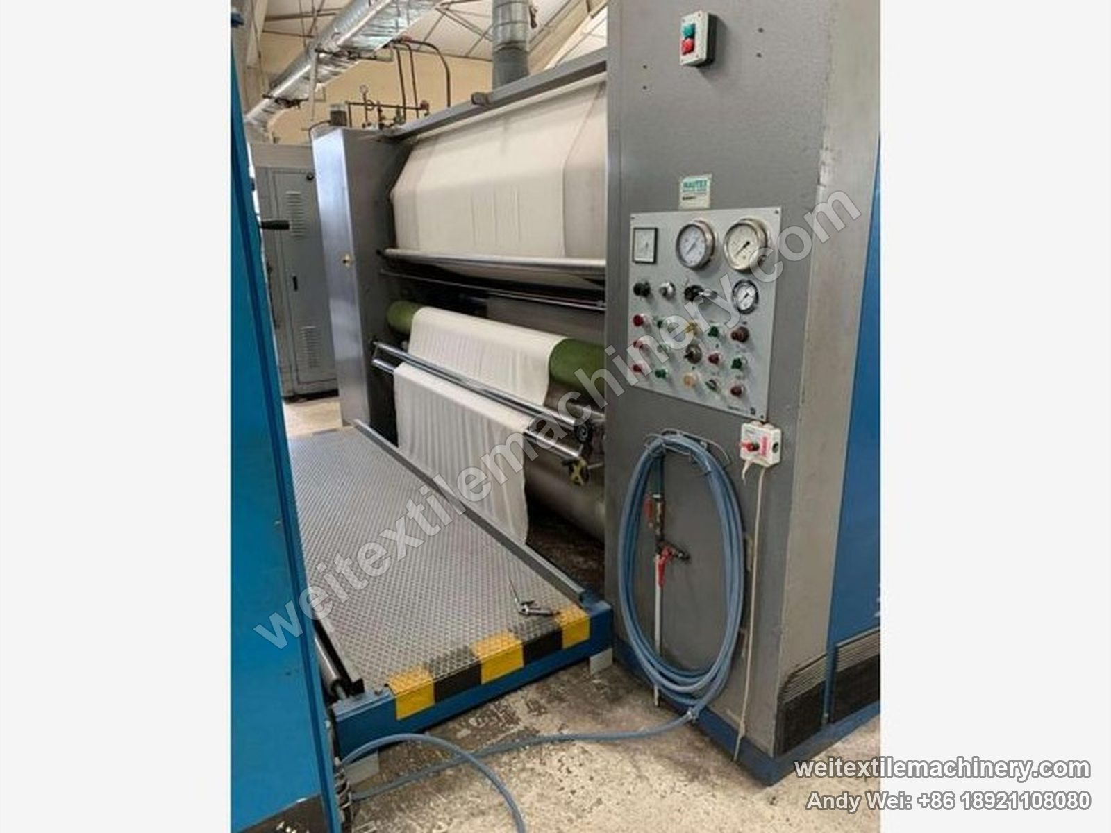 Used Sperotto Rimar MD-M continuous decatizing machine (1.7 m), operator side with white fabric on the rolls, button panel with gauges and grating platform