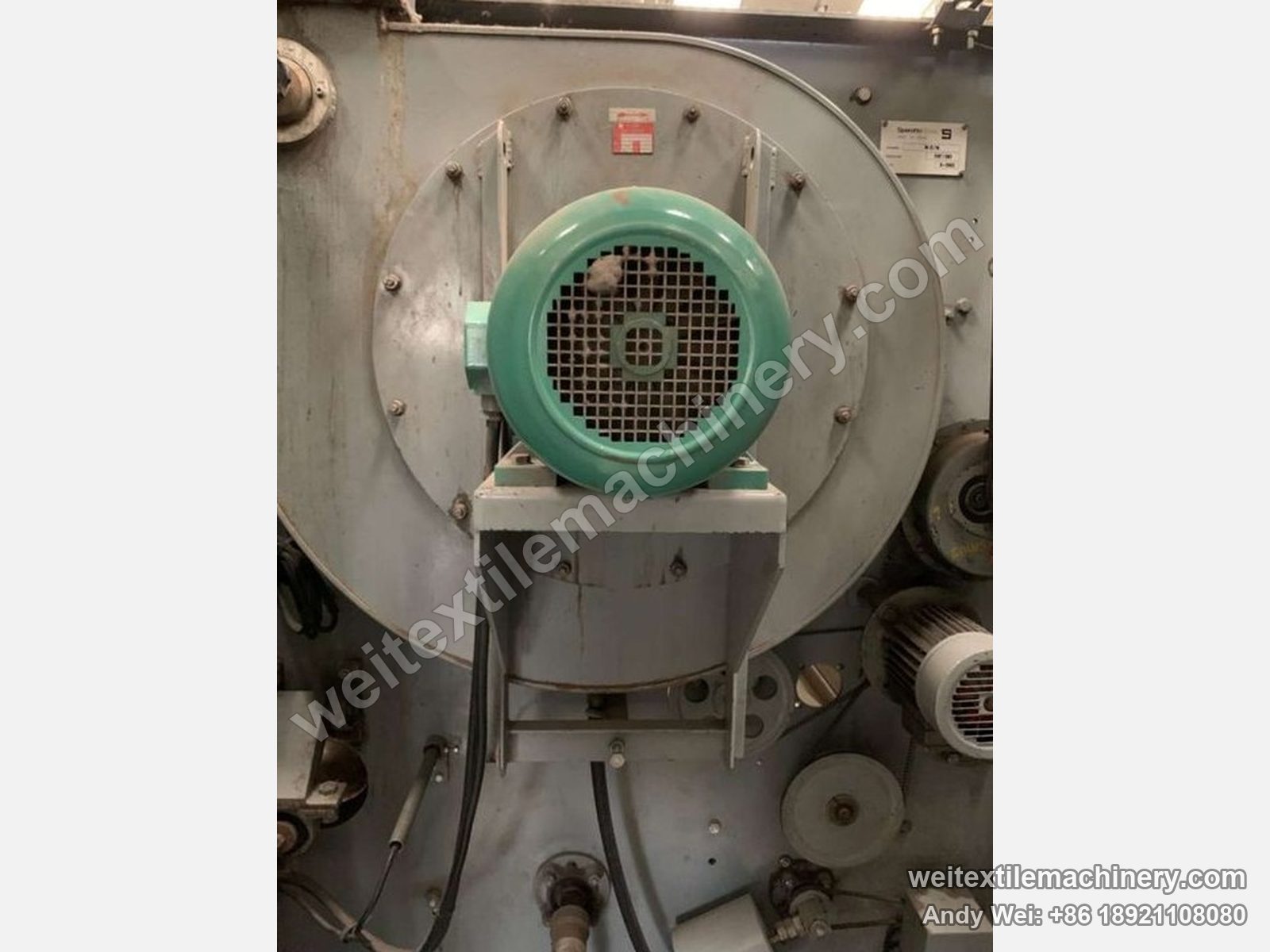 Used Sperotto Rimar MD-M continuous decatizing machine (1.7 m), blower and drive side with turquoise motor, pulleys and a nameplate (text not legible)