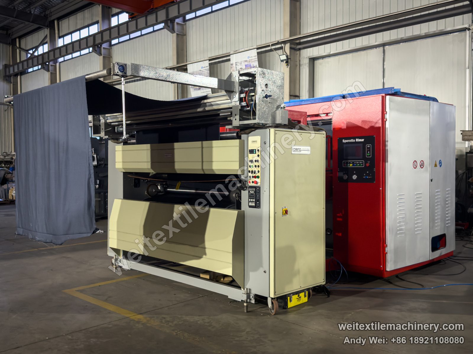 Used Sperotto Rimar Multidecat 2.0 continuous decatizing machine, front view with Sperotto Rimar panel, fabric roll and a Corino unit in front