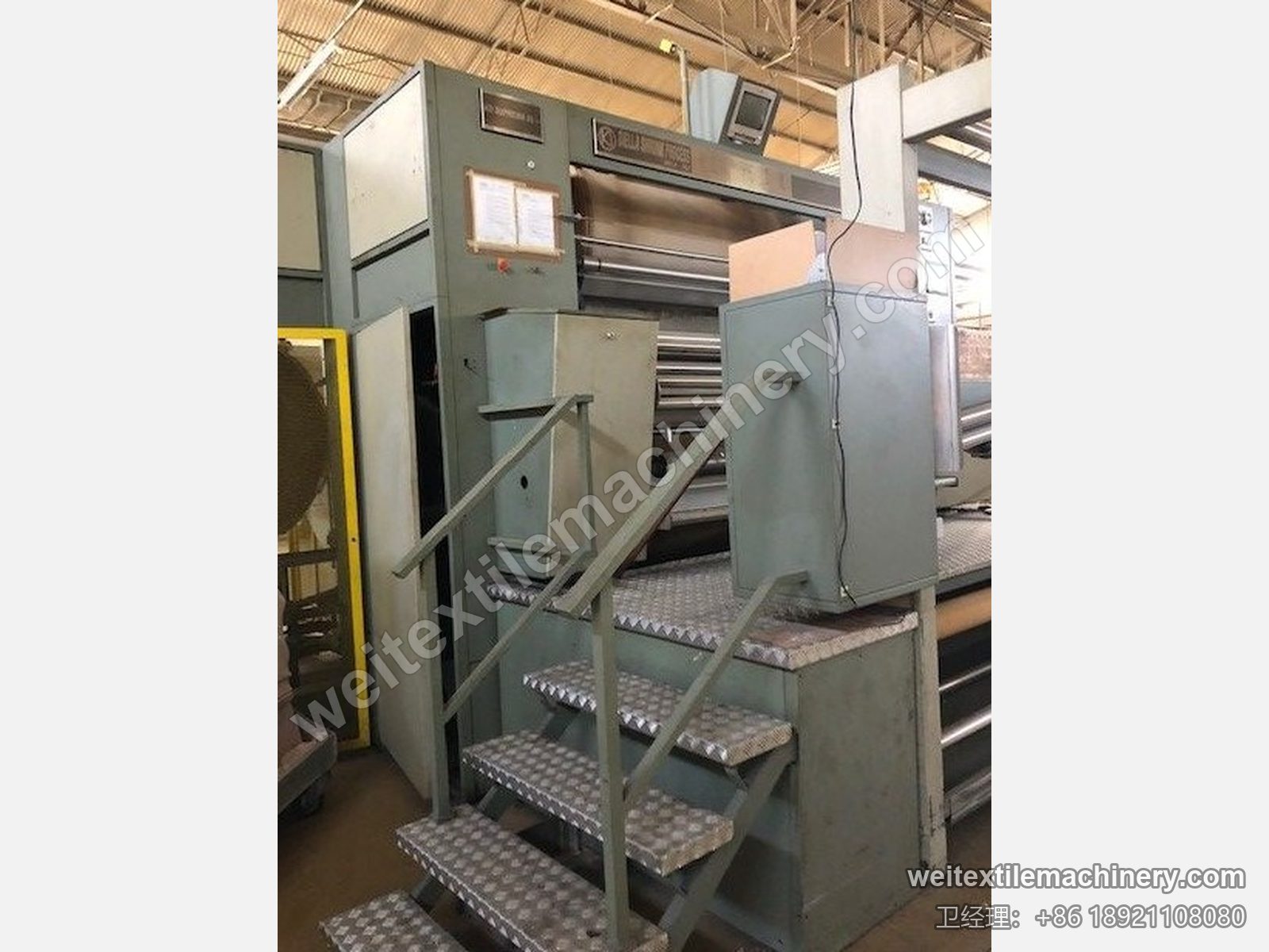 二手 KD 1600 罐蒸机正面，操作平台登梯、Biella Shrunk Process 标牌与触摸屏