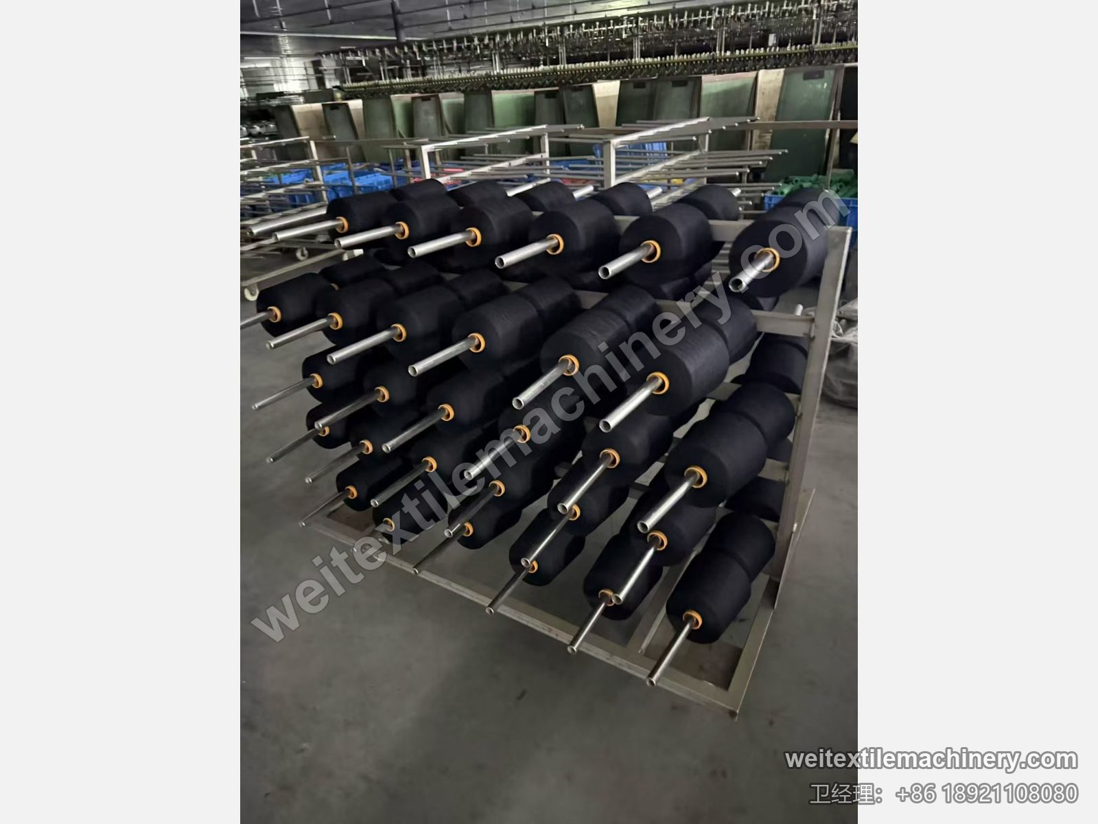 二手 Obem VFPV 蒸纱机配套蒸纱车，锭杆上装满黑色筒纱