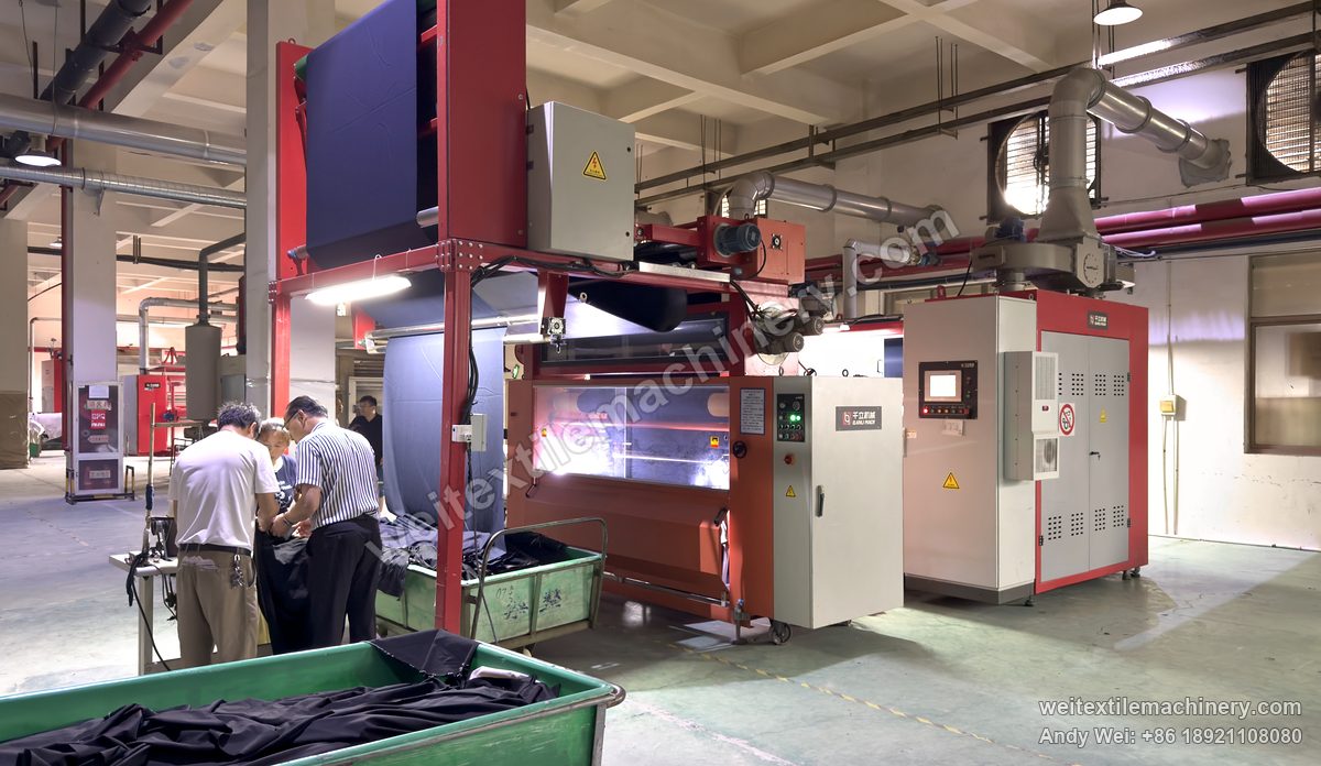 QL WPF-LXZN-P Continuous Pressure Decatizing Machine, in operation at a customer mill, dark fabric over the top frame