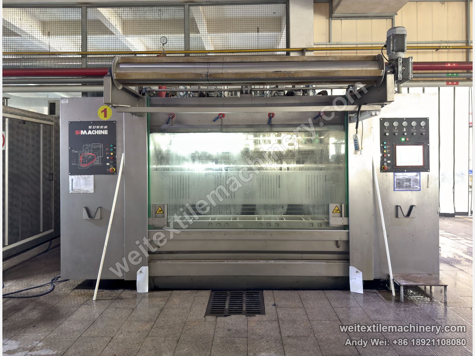 QL WPF-4XS Four-Channel Wool Scouring and Milling Machine, front view at a customer mill, four handles above the window